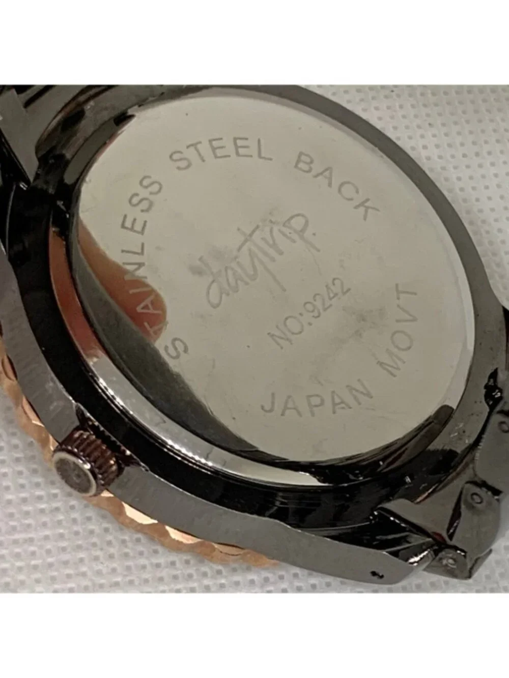 DayTrip iced dial gold black tone women watch large case 46mm size 6.5” running
